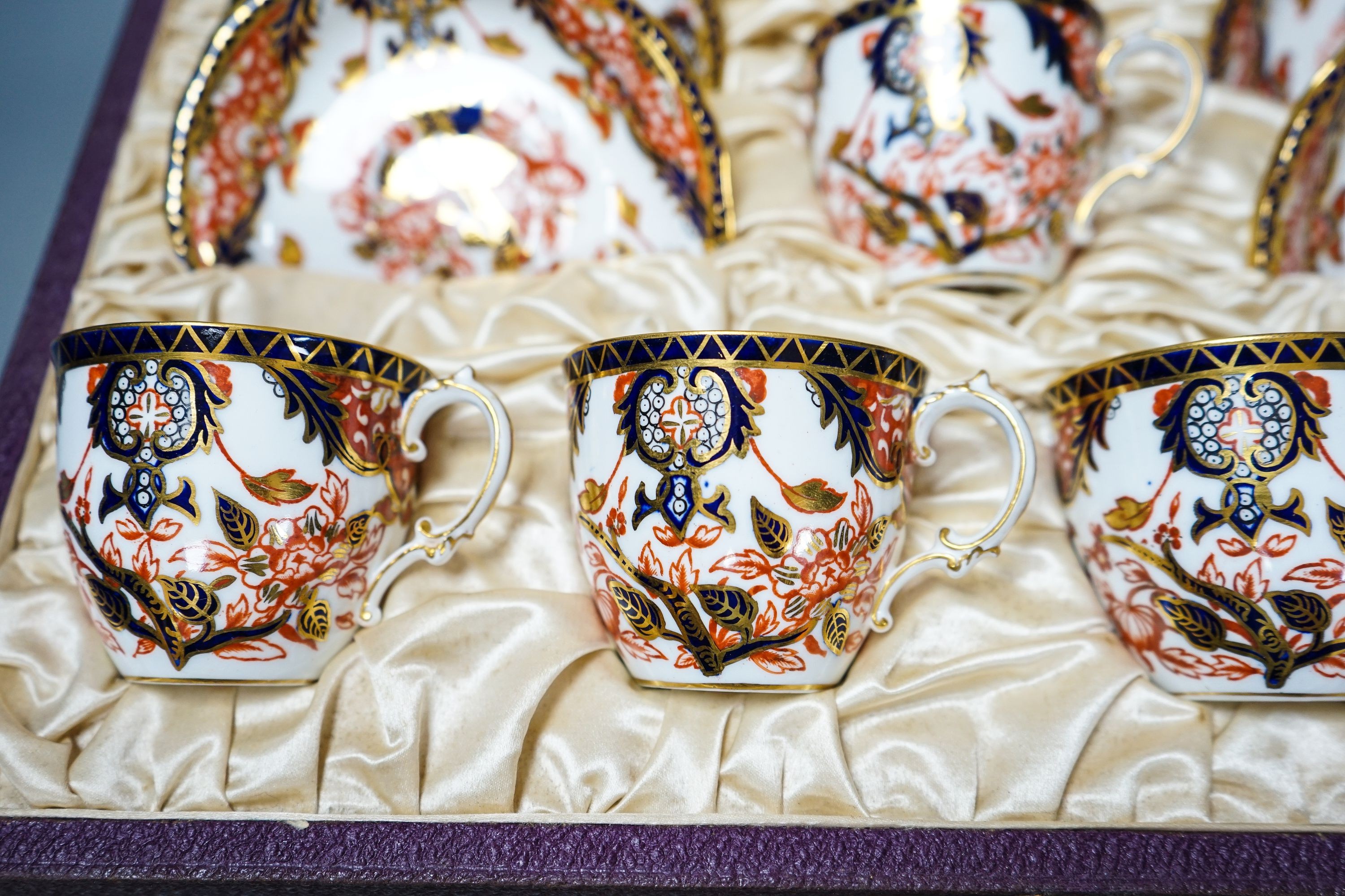 A cased Crown Derby Imari pattern coffee service
